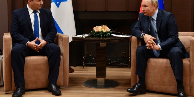 Russian President Vladimir Putin attends a meeting with Israeli Prime Minister Naftali Bennett