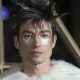 Ezra Miller flashes into and out of custody after an incident at a bar in Hawaii