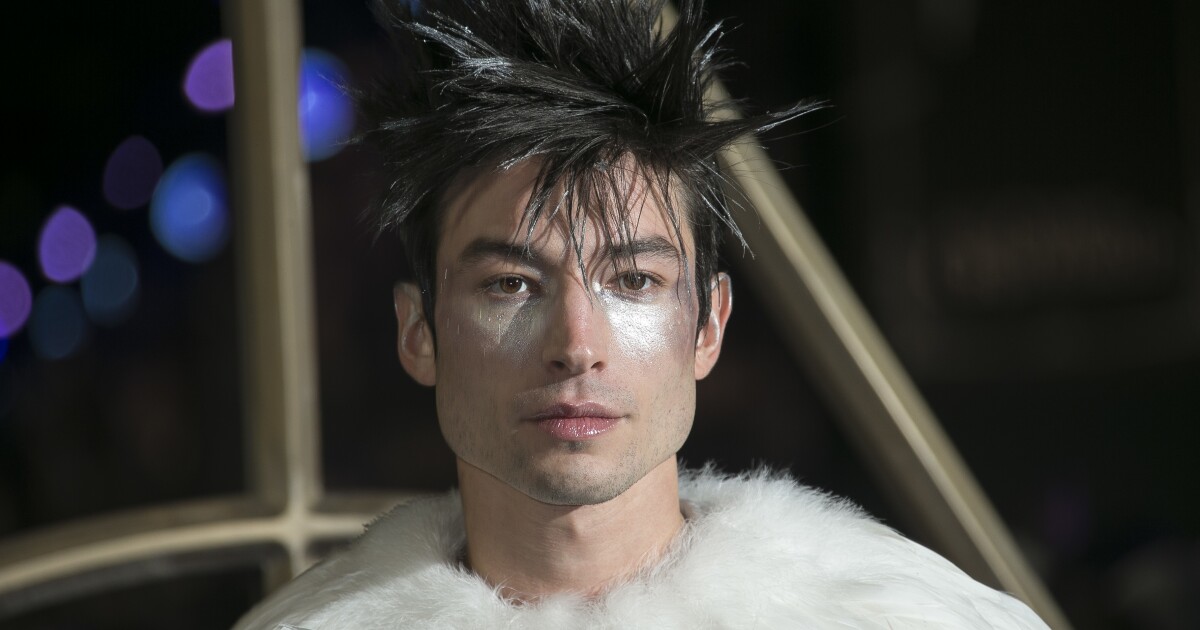 Ezra Miller flashes into and out of custody after an incident at a bar in Hawaii