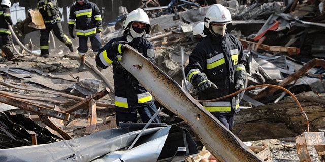 Rescuers eliminate the consequences of the Russian shelling of a food warehouse, Brovary, Kyiv Region, north-central Ukraine on March 29, 2022.