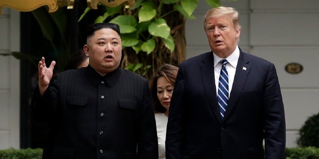 In this Feb. 28, 2019, file photo, President Donald Trump and North Korean leader Kim Jong Un take a walk after their first meeting at the Sofitel Legend Metropole Hanoi hotel, in Hanoi.  