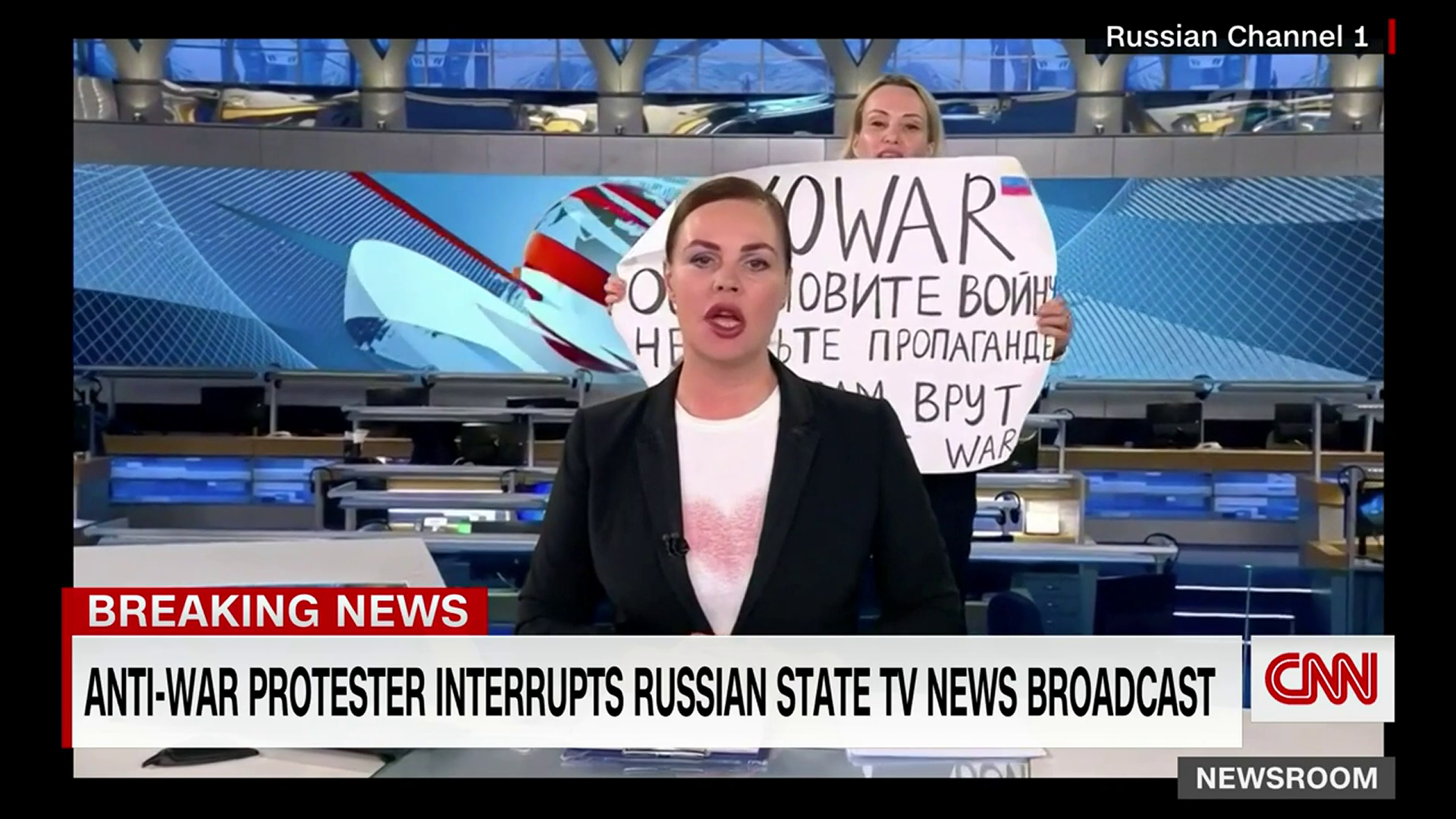 Anti-war protester interrupts Russian state TV news broadcast