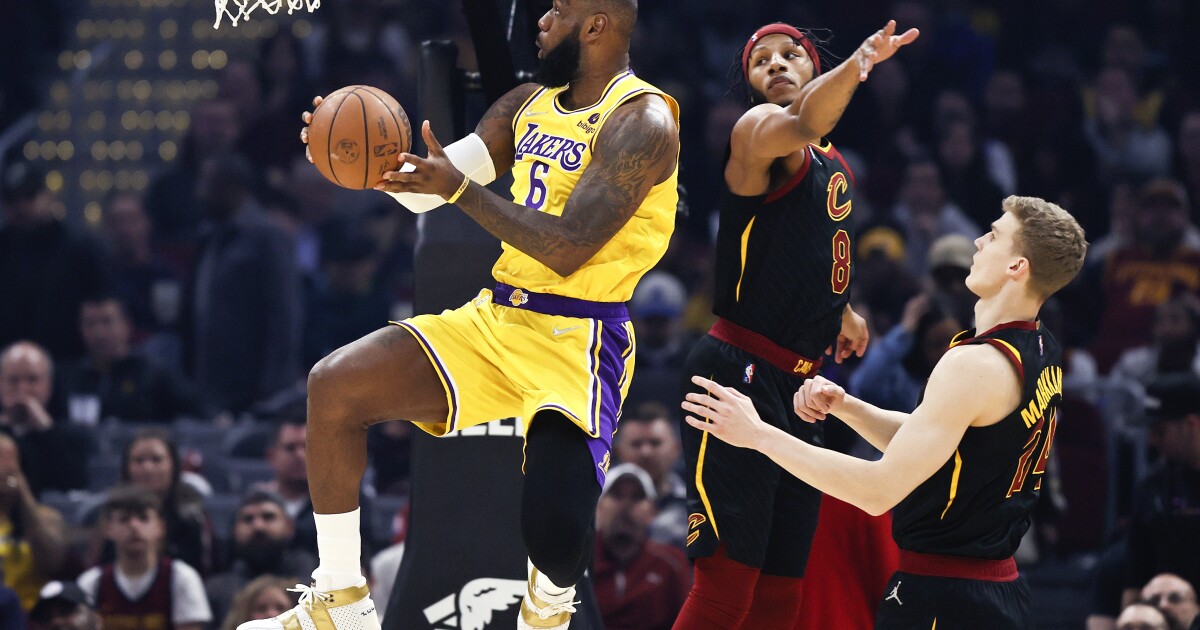 LeBron James has triple-double, monster dunk in Lakers’ win over Cavaliers