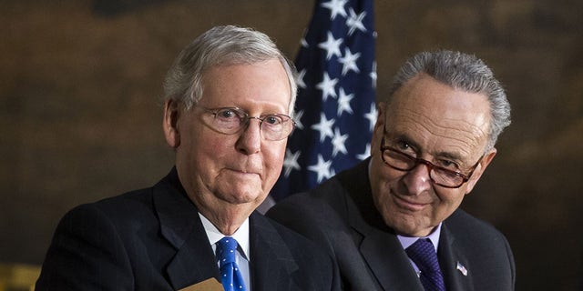 Sens. Mitch McConnell and Chuck Schumer during an event at the Capitol on Jan. 17, 2018.