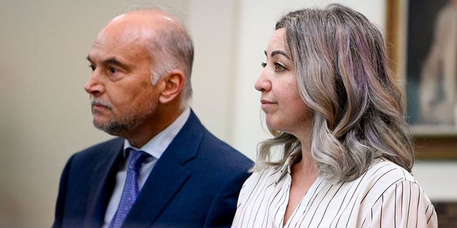 RaDonda Vaught and her attorney Peter Strianse listen as verdicts are read at the end of her trial in Nashville, Tenn., Friday, March 25, 2022. 