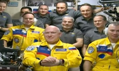 Russians’ yellow-and-blue flight suits weren’t a political statement, a NASA astronaut says.