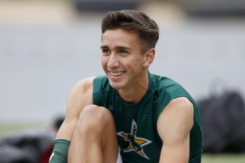 Cajon's Seth Johnson smiles as he prepares to compete at the Trabuco Hills Invitational on Saturday.