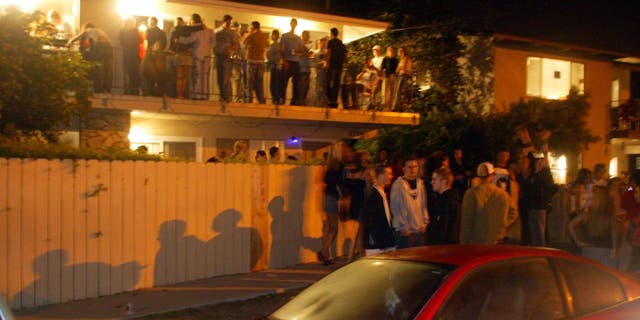 In a typical scene along Del Playa Blvd on a Friday or Saturday night in Isla Vista, party goers stand on balconies and spill out into the street. The Santa Barbara Sheriff's keeps a team of dozens of deputies busy on foot and bicycle patrols protecting the students from themselves and outsiders.