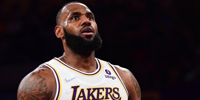 LeBron James #6 of the Los Angeles Lakers shoots a free throw during the game against the Detroit Pistons on November 28, 2021, at Staples Center in Los Angeles, California.