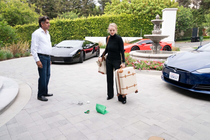 Sunny Balwani (Naveen Andrews) and Elizabeth Holmes (Amanda Seyfried) in the finale of "The Dropout."