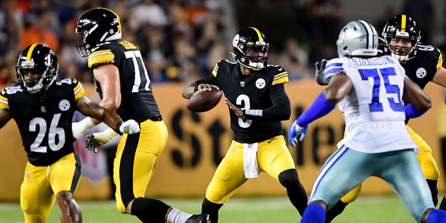 Dwayne Haskins #3 of the Pittsburgh Steelers drops back to pass in the second half during the 2021 NFL preseason Hall of Fame Game against the Dallas Cowboys at Tom Benson Hall Of Fame Stadium on August 5, 2021 in Canton, Ohio. 