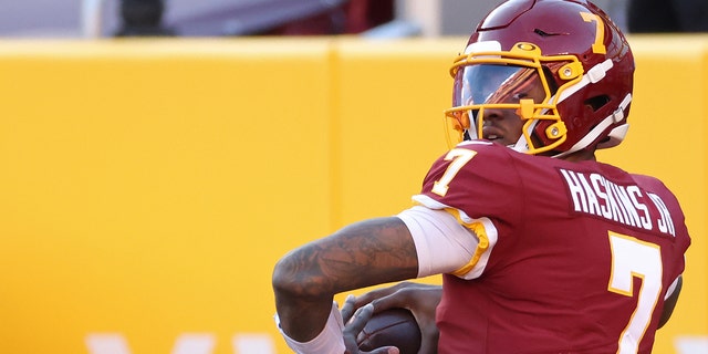 Washington Football Team quarterback Dwayne Haskins passes the ball during warm-ups prior to a game against the Carolina Panthers at FedEx Field Dec 27, 2020.