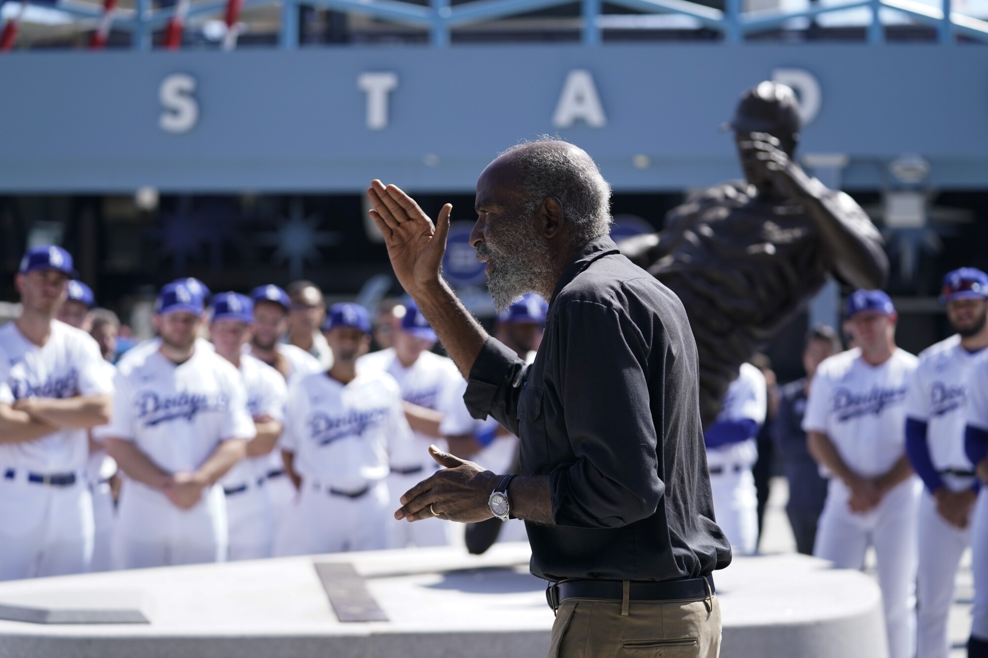 David Robinson, son of Jackie Robinson, speaks to Dodgers players and staff.