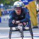 The men’s defending wheelchair champion withdraws less than an hour before the race.