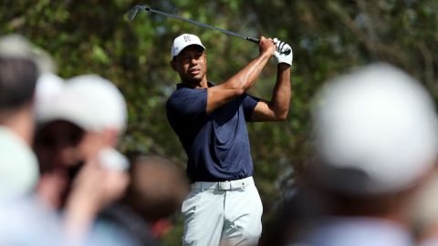 Woods takes a practice swing on the fourth tee during a practice round prior to the Masters. 