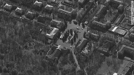 A March 21 satellite image of the Centre of Culture and Leisure in Dokuchaevsk shows buses outside.