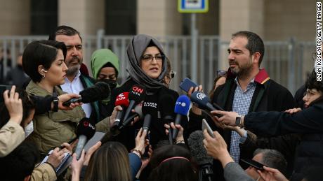 Hatice Cengiz, the fiancee of murdered Saudi critic Jamal Khashoggi, answers journalists&#39; questions outside an Istanbul courthouse on April 7. The court confirmed a halt of the trial in absentia of 26 suspects linked to Khashoggi&#39;s killing and the transfer of the trial to Saudi Arabia. Cengiz said she would appeal the Turkish court&#39;s decision. Khashoggi, a 59-year-old journalist, was killed inside the Saudi consulate in Istanbul on October 2, 2018 in a gruesome murder that shocked the world.