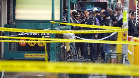 Police tape blocks off the subway stop on Tuesday.