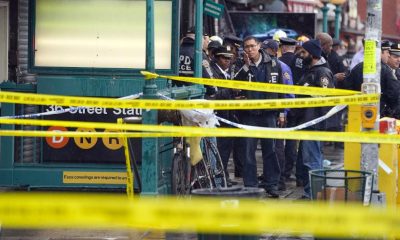 Manhunt underway for suspect who used gas canister and opened fire on Brooklyn subway