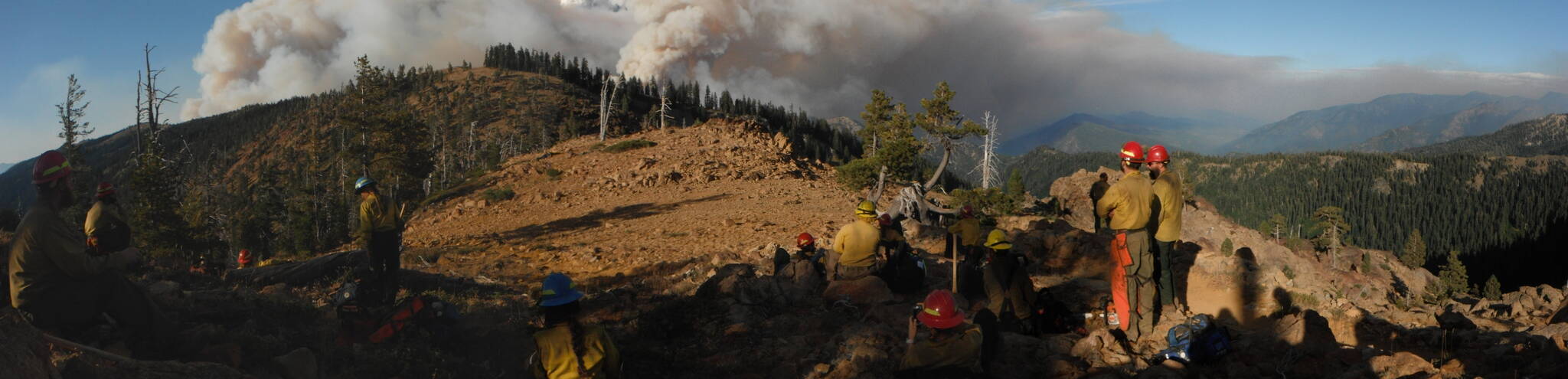 Courtesy photo / U.S. Forest Service 
A Forest Service fire crew surveys a break in a ridgeline during an operation. Fire crews from Alaska are frequently deployed to the Lower 48 to help combat wildfires that are growing larger and closer to urban areas in many cases.