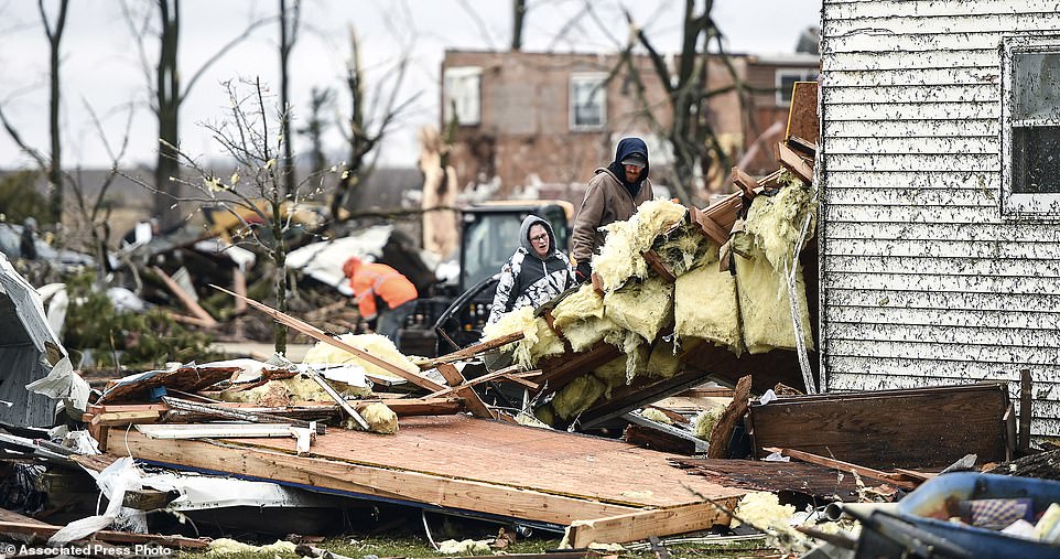 Residents in the small southeastern Minnesota farming community of Taopi were cleaning up after a devastating tornado destroyed half of the town's homes, toppled tall trees and left piles of debris