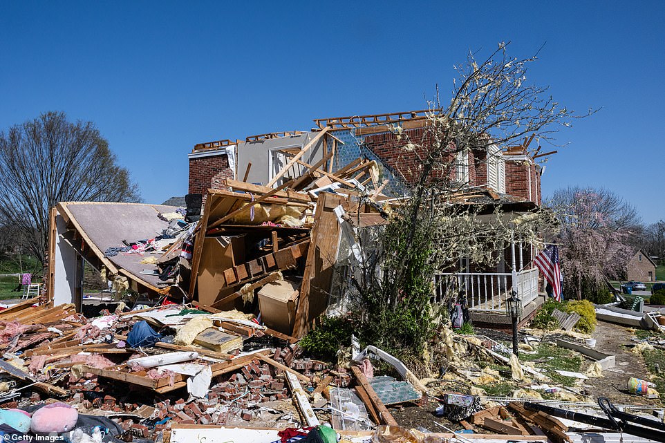 A heavily damaged home is seen in the Glenmary subdivision on April 14, 2022 in Louisville, Kentucky