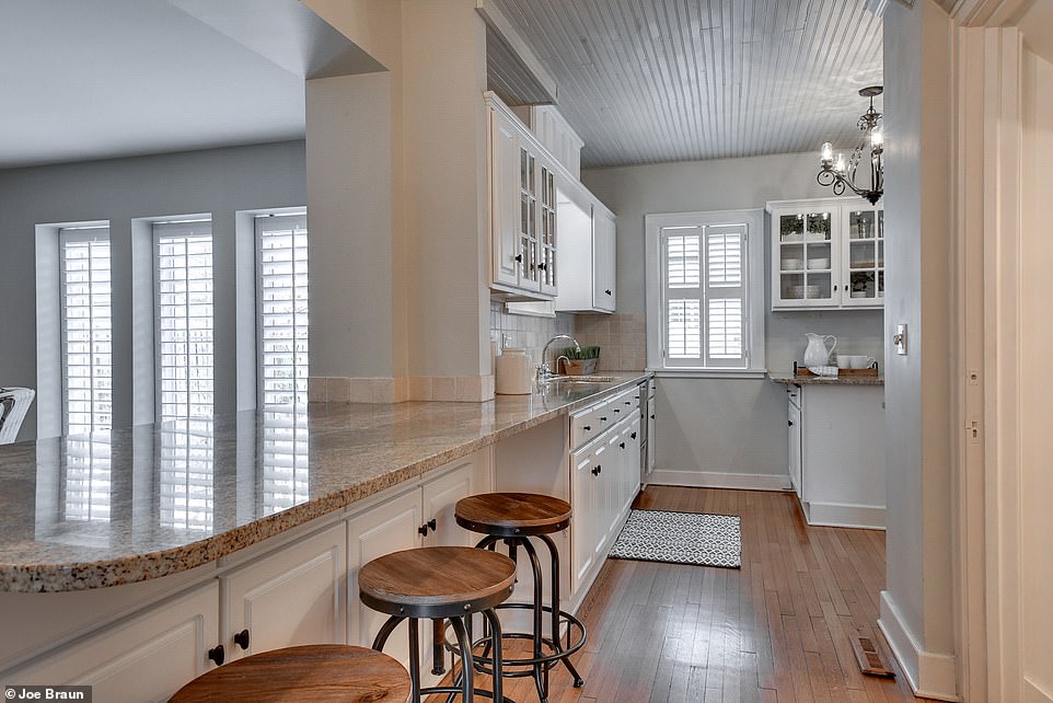 It features a large counter space that can accommodate up to six barstools for prime entertaining