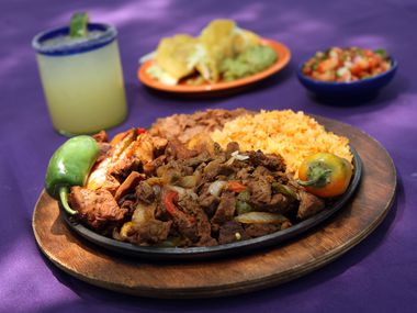 A margarita and a plate of Tex-Mex on the patio at Joe T. Garcia's in Fort Worth: That's a...