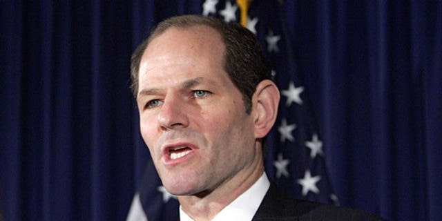 March 12, 2008: former New York Gov. Eliot Spitzer is seen announcing his resignation.