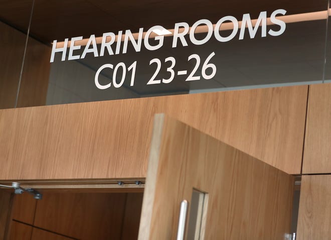 A sign marks hearing rooms Friday, March 11, 2022 at the new Marion County Courthouse on the Community Justice Campus.