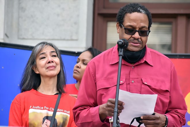 Gareth Hall addresses crowds in Philadelphia with his wife Fe at his side. The father of 19-year-old Christian Hall said he felt "overwhelmed" by the turnout at Saturday's rally. Hall was shot and killed by Pennsylvania State Troopers in the Poconos while experiencing what lawyers are calling a "mental health crisis."