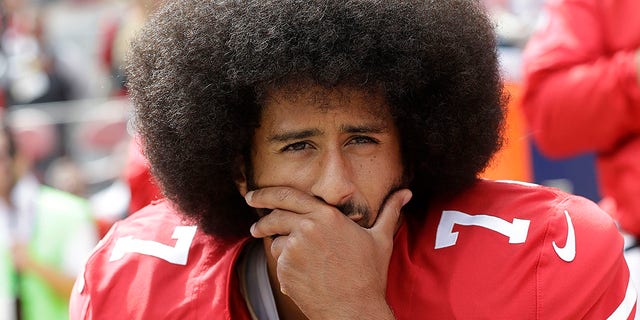 San Francisco 49ers quarterback Colin Kaepernick kneels during the national anthem before the Dallas Cowboys game on Oct. 2, 2016, in Santa Clara, California.