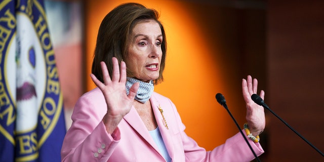 Speaker of the House Nancy Pelosi, D-Calif., meets with reporters at the Capitol in Washington, Wednesday, Aug. 25, 2021. 