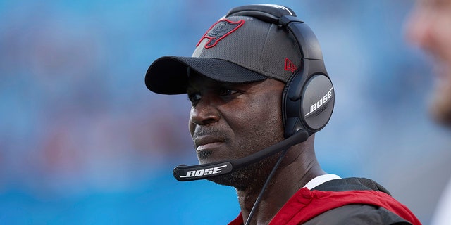 Tampa Bay Buccaneers defensive coordinator Todd Bowles watches from the sideline during a game against the Carolina Panthers Dec. 26, 2021, in Charlotte, N.C. 