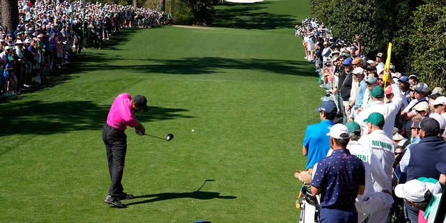 Tiger Woods tees off on the 18th hole during the first round at the Masters golf tournament on Thursday, April 7, 2022, in Augusta, Ga.