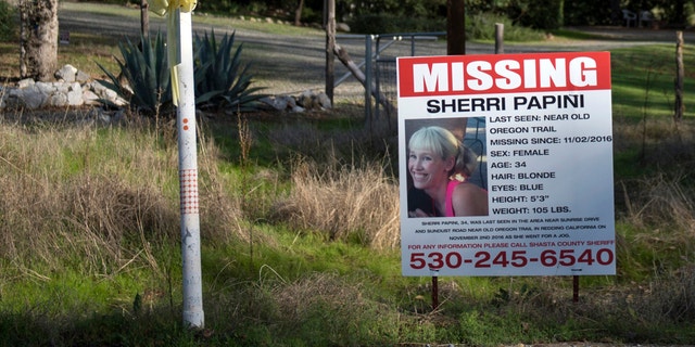 In this Nov. 10, 2016, file photo, a "missing" sign for Redding, Calif., resident Sherri Papini is seen near the location where the mother of two is initially believed to have gone missing while jogging.