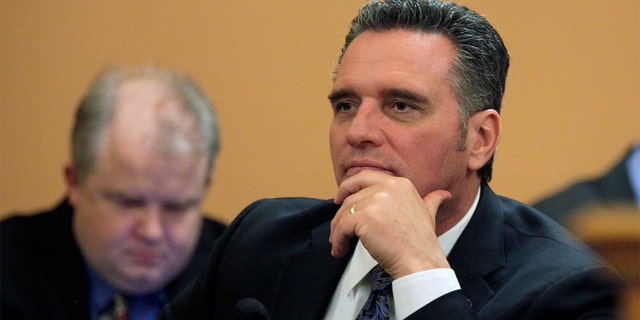 Kansas Senate President Ty Masterson, R-Andover, presides over a meeting of fellow GOP senators at the Statehouse in Topeka, Kan., Wednesday, March 9, 2022.