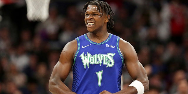 Timberwolves forward Anthony Edwards celebrates after scoring against the San Antonio Spurs Thursday, April 7, 2022, in Minneapolis.