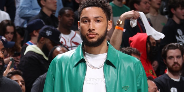 Ben Simmons of the Brooklyn Nets watches the Cleveland Cavaliers game during the 2022 Play-In Tournament on April 12, 2022, in New York.