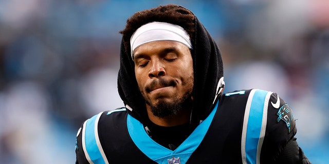 Cam Newton #1 of the Carolina Panthers leaves the field after a loss to the Washington Football Team at Bank of America Stadium on Nov. 21, 2021 in Charlotte, North Carolina.