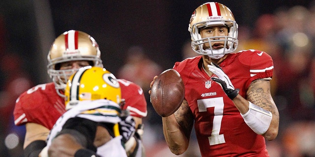 San Francisco 49ers quarterback Colin Kaepernick (7) looks for a receiver during the second quarter of the team's NFC divisional playoff NFL football game against the Green Bay Packers in San Francisco, Jan. 12, 2013. 