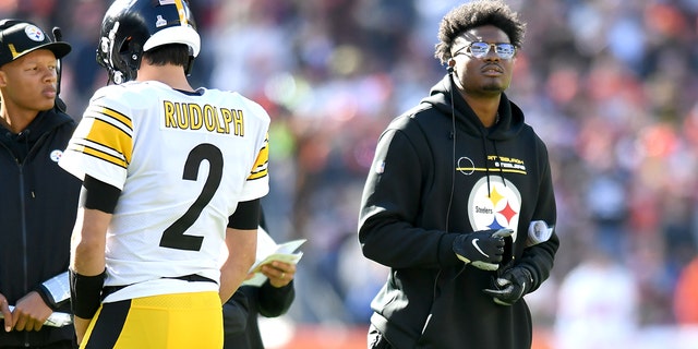 Dwayne Haskins of the Pittsburgh Steelers watches from the sidelines during the Browns game at FirstEnergy Stadium on Oct. 31, 2021, in Cleveland, Ohio.