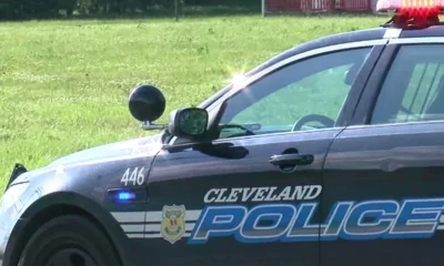 Video shows men pointing guns at Cleveland police officer