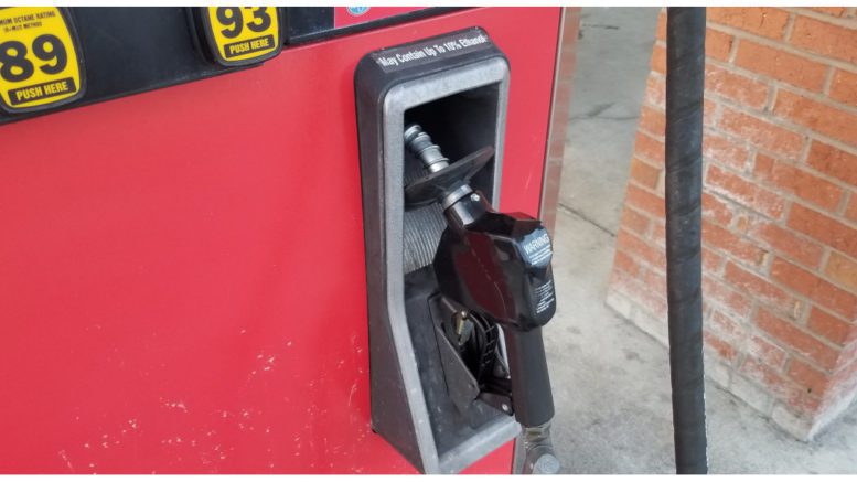 Gasoline pump resting in its cradle