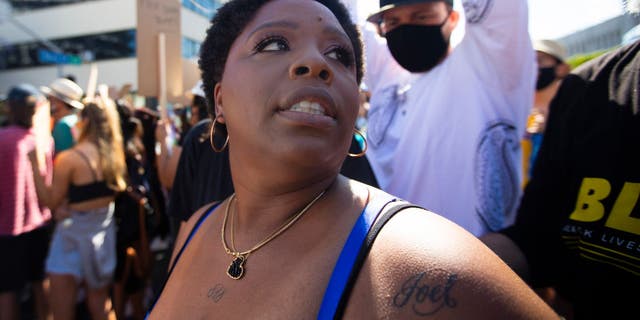 FILE – HOLLYWOOD, CALIF., JUNE 7, 2020:  Patrisse Cullors is one of the three co-founders of the Black Lives Matter movement. She participated in the march in Hollywood, Calif., on Sunday June 7, 2020.  (Francine Orr/ Los Angeles Times via Getty Images)