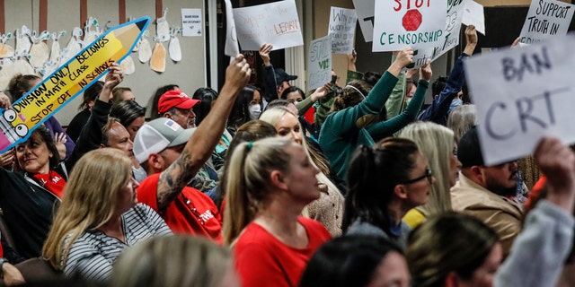 Yorba Linda, CA, Tuesday, November 16, 2021 - An even mix of proponents and opponents to teaching Critical Race Theory are in attendance as the Placentia Yorba Linda School Board discusses a proposed resolution to ban it from being taught in schools.  Robert Gauthier/Los Angeles Times via Getty Images)