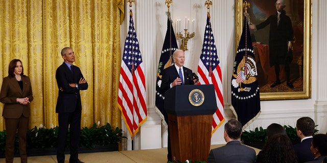Biden delivers remarks during an event to mark the 2010 passage of the Affordable Care Act with Vice President Kamala Harris and former President Barack Obama.