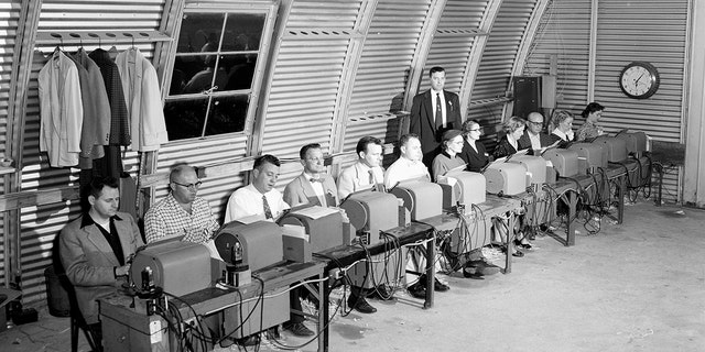 Media work in the Western Union Press Tent during the 1955 Masters Tournament at Augusta National Golf Club on April 10, 1955 in Augusta, Georgia. 