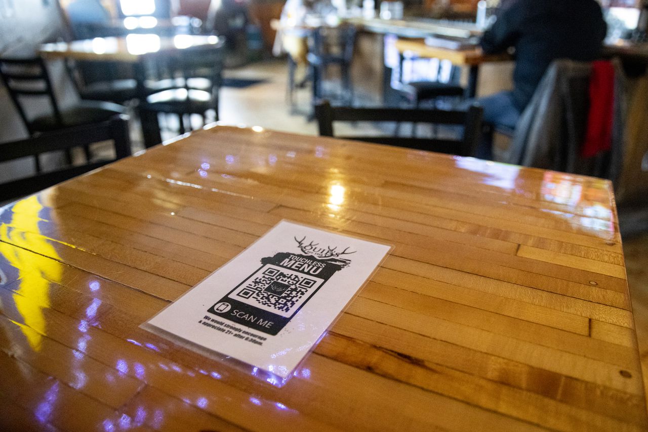 QR code menus are sticking around at Michigan restaurants. Here’s how to scan safely.