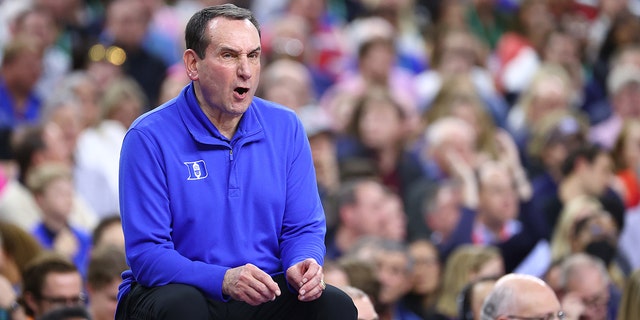 Head coach Mike Krzyzewski of the Duke Blue Devils looks on against the North Carolina Tar Heels during the semifinal game of the 2022 NCAA Men's Basketball Tournament Final Four at Caesars Superdome on April 02, 2022 in New Orleans, Louisiana.